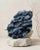 A monumental natural dark blue Fluorite specimen selected for its architectural cubic crystal structure, frosted secondary...