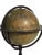 This globe from circa 1905 sits on a metal stand. This piece has an attribution mark, I am sure that it is completely...