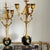 How lovely is this pair of antique gilt bronze and marble candelabra!? They have all of the Hallmarks of the Empire style...