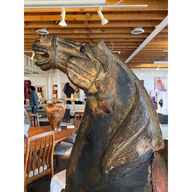 A wonderful 20th century carved painted wooden Chinese horse purchased in 1985 from a prominent Hong Kong Gallery. A copy...