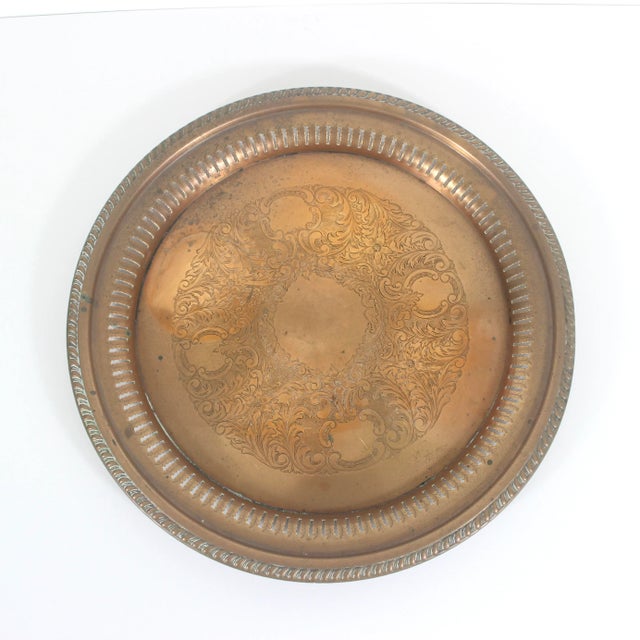 Fantastic Vintage copper tray with embossed floral base, pierced sides and rope edge detail and heavy patina. It has some...