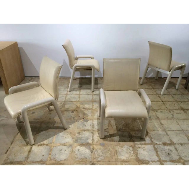 Rare set of four lacquered wood and leather "Dilos" dining chairs designed by Guido Faleschini for the Pace collection.