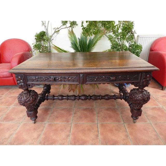 Fine Late 18th Century Carved Country Oak Library Table, circa 1790 Material: Oak, Metal Castors An impressive late 18th-...