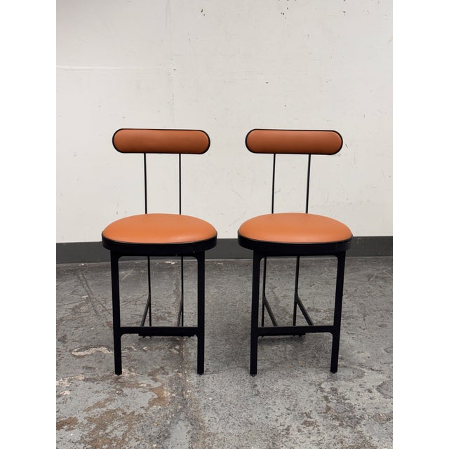 Design Plus Gallery presents a Pair of Swivel Counter Stools from Michael Oren Design. These stools are in the style of...