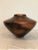 The shape and glaze on this artist signed pottery is wonderful. Delicately applied handles with a beautiful brown, black...