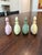 Lot of four vintage 1978 Porcelaine Franklin perfume bottles featuring jasperware-style raised white floral reliefs...