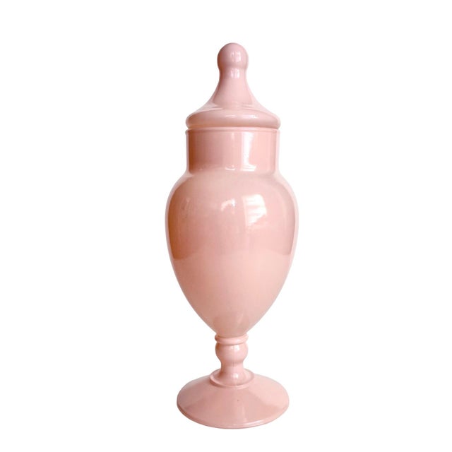 A mid-century hand-blown blush pink opaline urn from the Empoli glassworks of Tuscany, in the classic neoclassical...