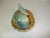 Hand crafted and hand painted pottery domed cheese server. This whimsical piece is painted in colors of copper and teal...