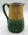 Circa 1880s pineapple pattern majolica pitcher, English. Twisted vine handle. The relief molded yellow pineapple...