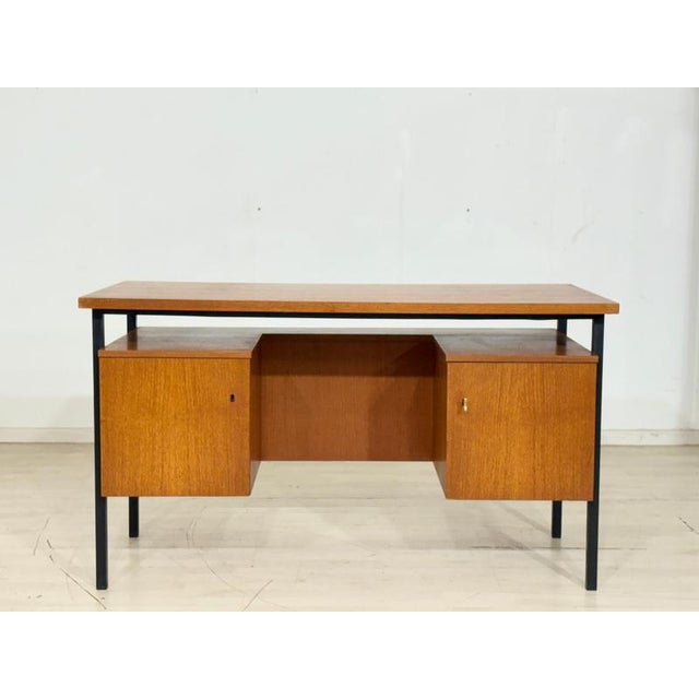 For sale is an original Mid-Century Modern desk from the 1960s, distinguished by its minimalist, Scandinavian-inspired...