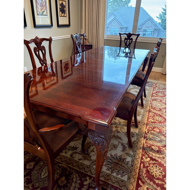 Styled after the Thomasville Collector's Cherry collection. The dining table is a Queen Anne style with cabriole legs and...