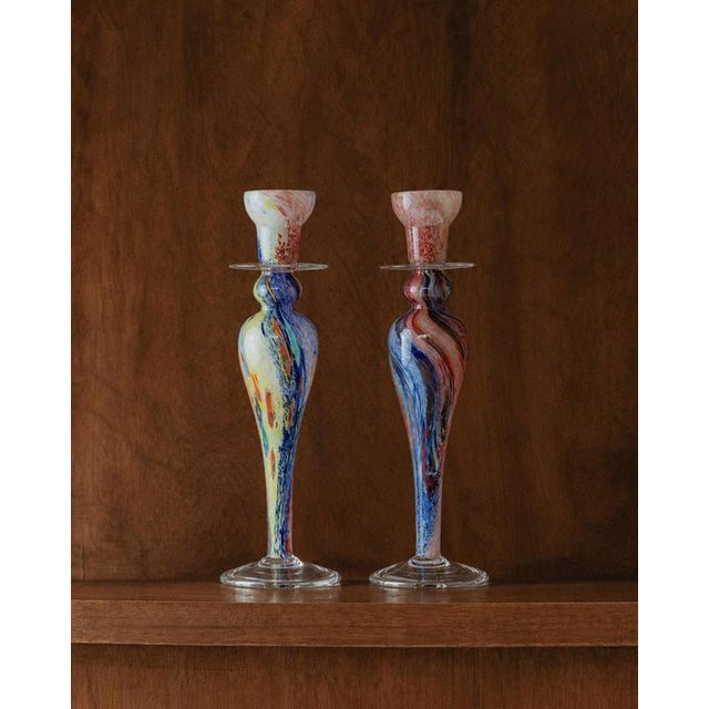 This vintage set of two large Murano glass candle holders from the 1980s is a beautiful example of expressive Italian art...