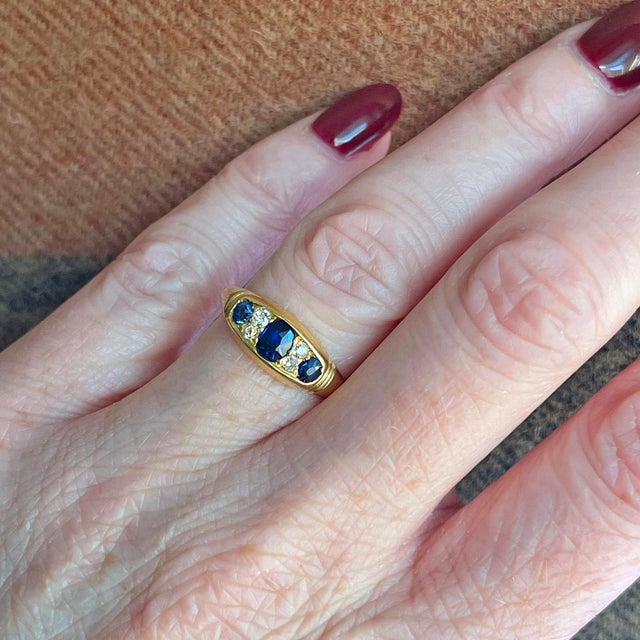 There’s a quiet elegance to this Victorian boat ring, a design beloved for its timeless shape and graceful curves. The...