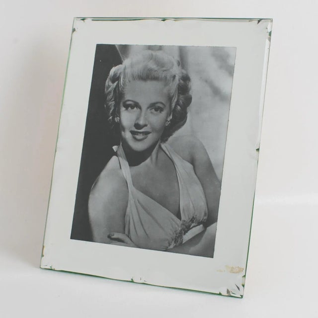 This stylish French mirrored picture photo frame features silver mirror-beveled edges with a deep geometric design. You...