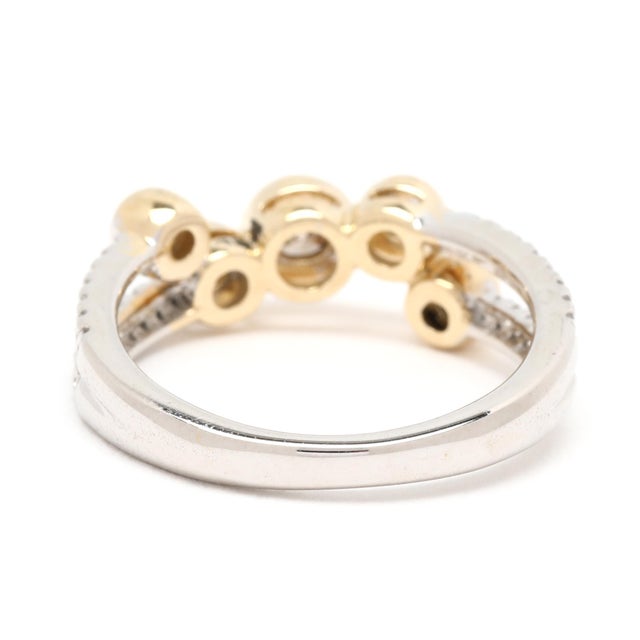 Stones: diamond round brilliant cut .25 btw brown color/ SI2-I1clarity single cut .9 mm .10 ctw HI color/ SI1-2 clarity...