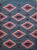 Add a touch of timeless Southwestern charm to your space with this vintage handwoven kilim rug, inspired by the geometric...