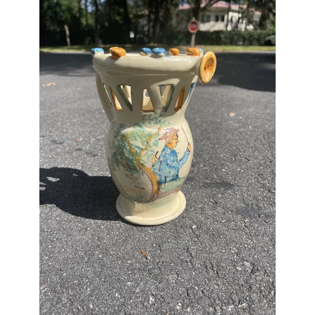 Vintage Italian signed pitcher from Grottaglie. Stunning, with a hand-painted detail of a man and blue and yellow balls at...