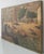 This early twentieth-century oil on canvas shows a Mediterranean fishing village at work. Men haul a net across a stone...