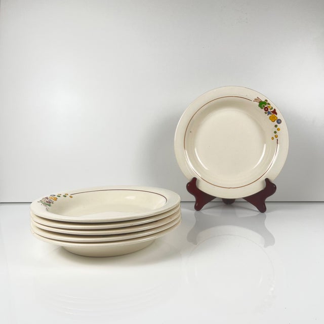 Set of 6 Longwy semi-deep plates, early 20th century, floral design Glazed earthenware Dimensions: Diameter: 22.5 cm...
