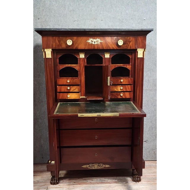 Empire Four-Column Secretaire in Flame Mahogany with Gilt Bronze Mounts, in Good conditions. Designed before 1890