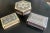 A complementary set of Middle Eastern wood boxes with shell and bone inlay. Hexagon: 6.5 w x 7 d x 2.5 h Medium: 5.5 w x 4...