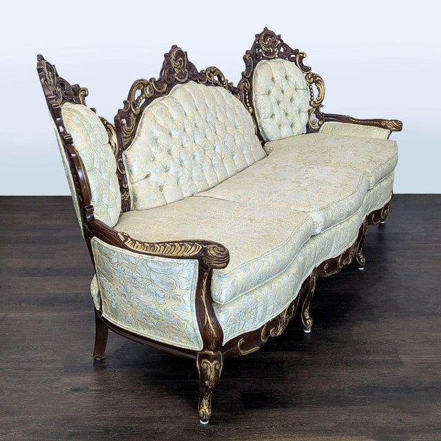 This Hausske-Harlen 3-seat sofa features a beautiful vintage Victorian design with elegant carved wood details and rich...