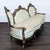This Hausske-Harlen 3-seat sofa features a beautiful vintage Victorian design with elegant carved wood details and rich...