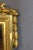 Large Louis XVI period giltwood mirror. The pediment is decorated with a large bow, the gilding is original, and the glass...