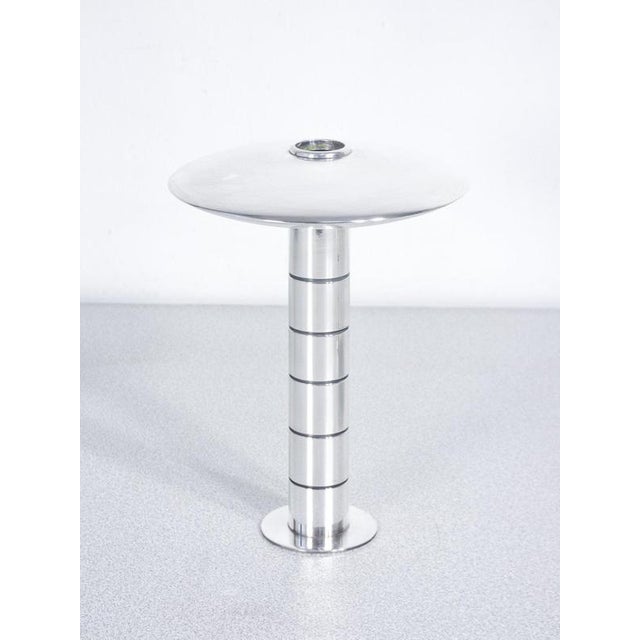 Pair of candlesticks designed by lino sabattini for argenteria sabattini in silver-plated metal origin italy period...