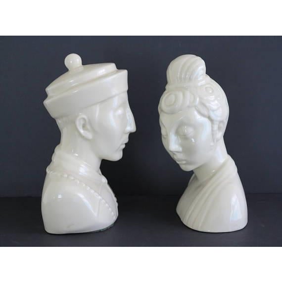 A stunning pair of midcentury james mont style chinoiserie blanc de chine look ceramic busts. Unsigned but still fabulous...