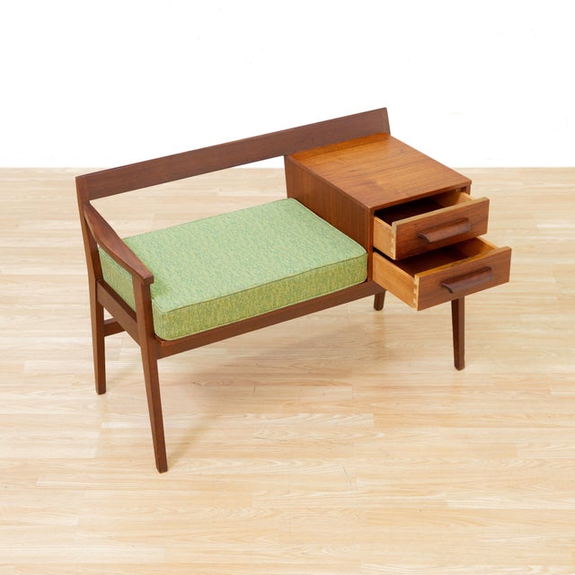 This Mid-century entryway bench has a wonderful design and Scandinavian aesthetic. Produced in England during the 1960s...