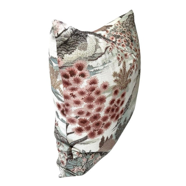 This rose mist pillow cover features a Chinoiserie-inspired design with cherry blossom trees and delicate flowers in a...