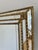 A large vintage Spanish Venetian-style rectangular beveled wall mirror, dating to the 1980s. The mirror has a decorative...