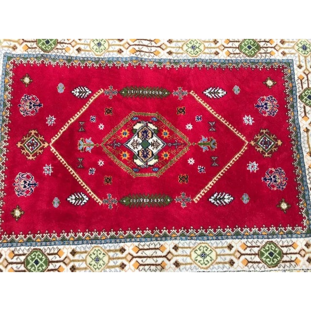 Nice vintage Rabat rug with beautiful geometric design and red field with green, blue, orange and yellow, entirely hand...