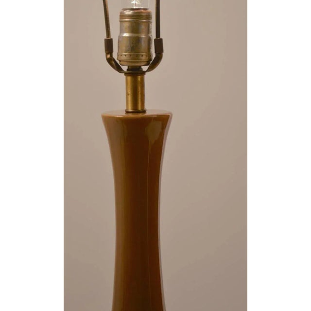 Mid-Century ceramic lamps, teardrop form body on squared wood base. Working, clean and original condition. California...