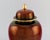 Carlton Ware, England. Large Rouge Royale lidded vase in hand-painted porcelain. Beautiful luster glaze. Gold decoration...