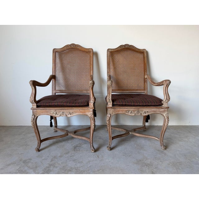 Hollywood Regency Vintage Hollywood Regency Louis XV-Style Carved Wood & Cane Armchairs – A Pair For Sale - Image 3 of 13
