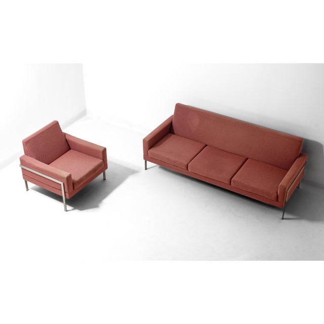 A minimalist 1960s lounge chair by Gelderland Holland, finished in a muted pink fabric. The frame is made from brushed...