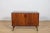 Small sideboard made of rosewood produced by the Danish manufacturer Lyby Møbelfabrik in the 1960s. There are shelves...