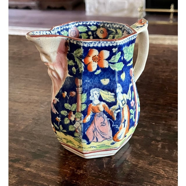 An exceptional and rare early 19th-century English Staffordshire pearlware (or ironstone) mask jug, dating to circa...