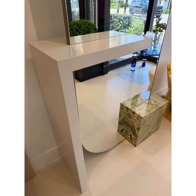 The Wood Shelf and Marble Cube Mirror is a freestanding floor mirror with a Lucent Bronze Metallic frame. It features...