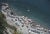 Positano Beach 1979 Elevated view looking down on sunbathers and parasols on the beach at La Scogliera beach in Positano,...