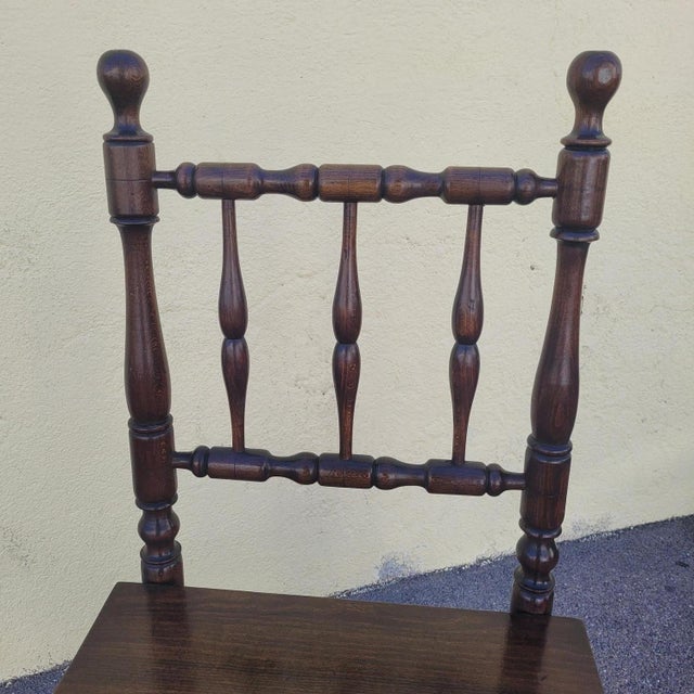 Stained beechwood library chair with a transforming mechanism: a simple hinge transforms the chair into a stepladder. Good...
