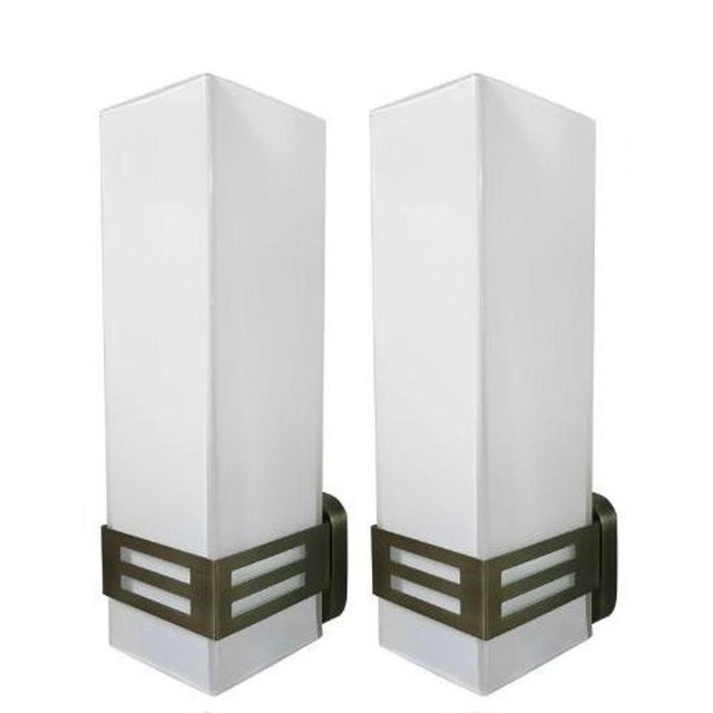 Elegant and architectural, this set of twelve limited-edition Grattacielo sconces features rectangular frosted Murano...