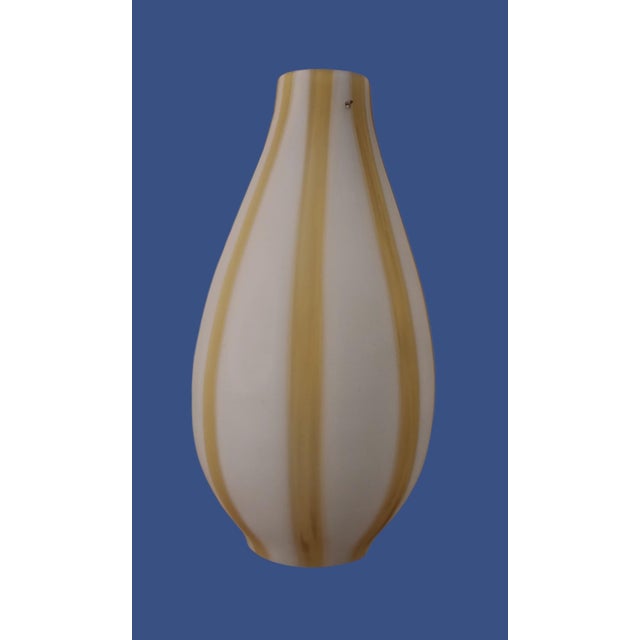 Pendant lamp in opaque opaline glass encased in strips of almost golden yellow glass. Larger than most standard lamps....