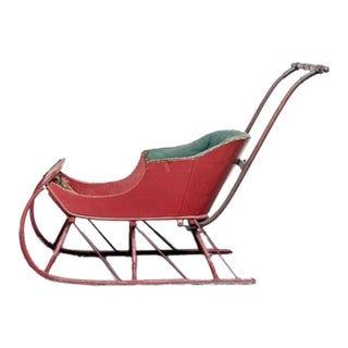 Antique Children's Push Sleigh, Upholstered and Red Paint Finished Wood Frame With Metallic Rails For Sale