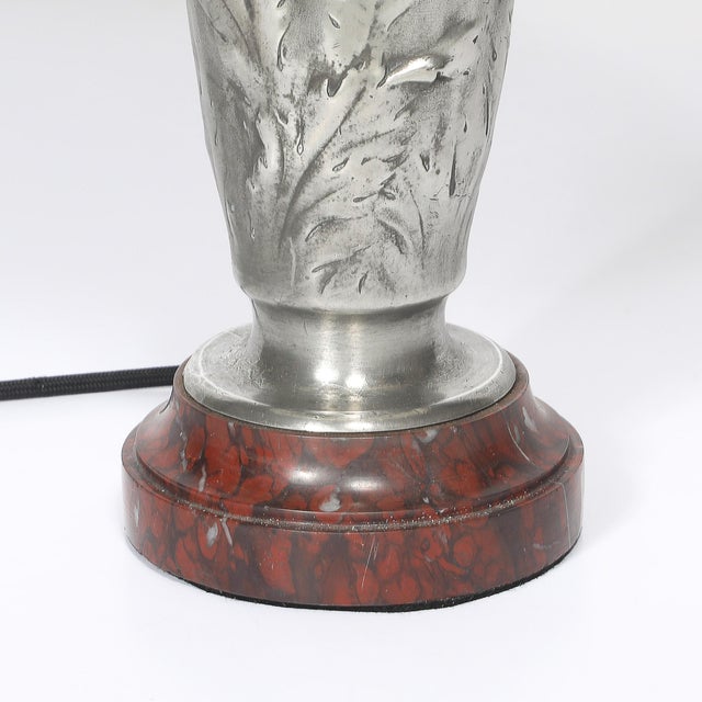 This Art Nouveau table lamp, crafted in France circa 1900 and signed E. Lelièvre, is an exceptional work of art that...
