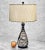 An Atomic Sculpted Art Pottery Table Lamp with Fiberglass Shade, c. Mid 20th Century. This Table Lamp would look...