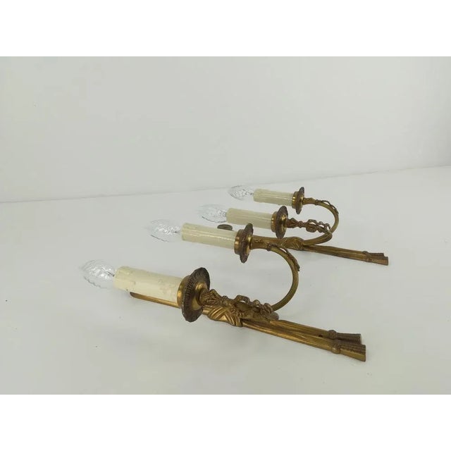 Couple polished brass wall light Re-electrified according to today's security standard. Version; E14 European Plug (up to...