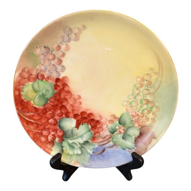 A beautifully hand-painted antique Haviland France porcelain cabinet plate, dating to approximately the turn of the 20th...